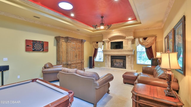 1929 Spruce Creek Lndg, Port Orange, FL 32128 - living area with a tray ceiling, recessed lighting, a large fireplace, billiards table, and crown molding