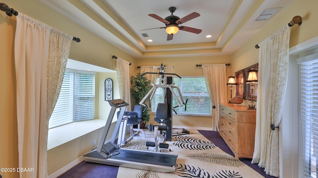 1929 Spruce Creek Lndg, Port Orange, FL 32128 - workout area featuring a ceiling fan, a raised ceiling, and recessed lighting