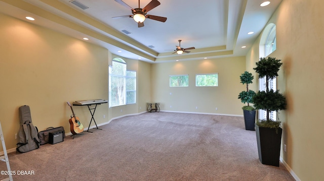 1929 Spruce Creek Lndg, Port Orange, FL 32128 - unfurnished room with carpet, a ceiling fan, recessed lighting, and a tray ceiling