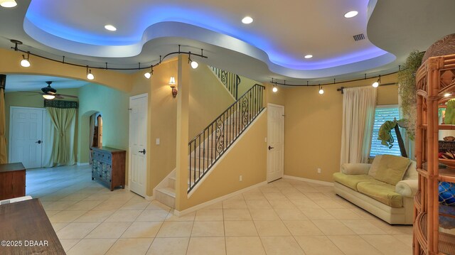 1929 Spruce Creek Lndg, Port Orange, FL 32128 - interior space featuring track lighting, a ceiling fan, tile patterned flooring, recessed lighting, and stairway