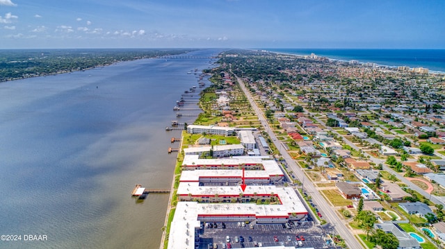 drone / aerial view with a water view