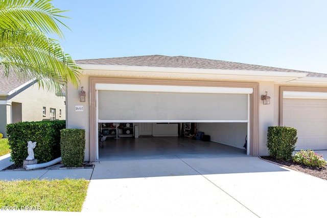 garage with driveway