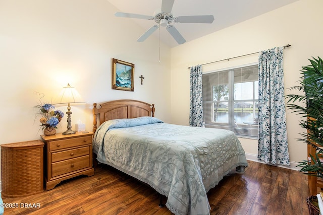 bedroom featuring dark wood-style floors, baseboards, and a ceiling fan