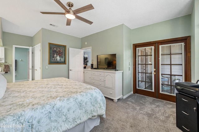 bedroom featuring ceiling fan, french doors, a textured ceiling, access to outside, and light carpet