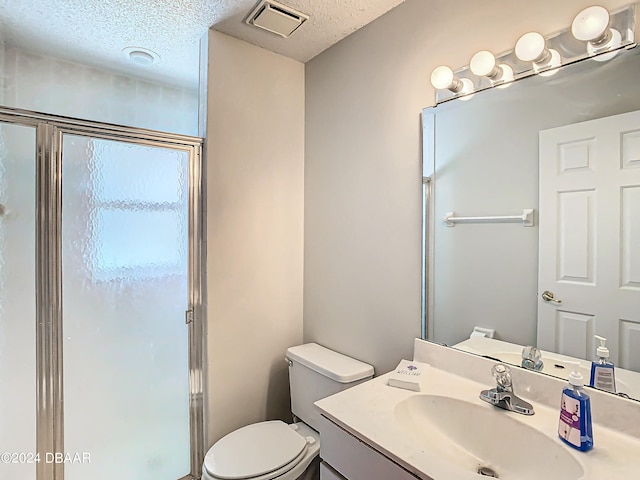 46 Coquina Point Dr, Ormond Beach, FL 32174 - bathroom with vanity, walk in shower, and a textured ceiling