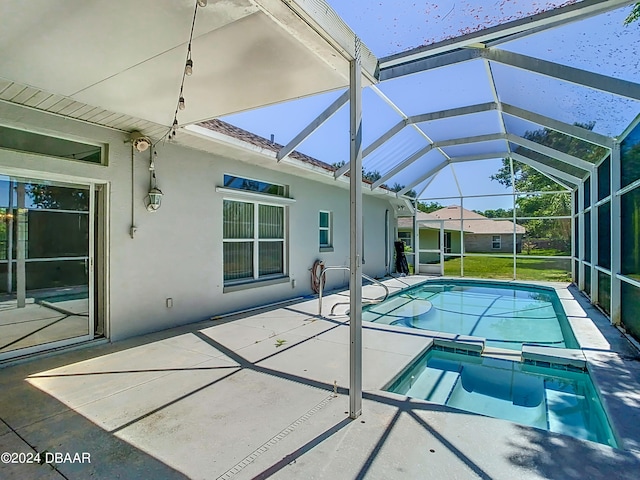 46 Coquina Point Dr, Ormond Beach, FL 32174 - view of pool with a patio, glass enclosure, and an in ground hot tub