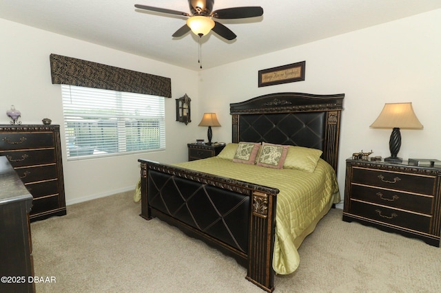 1313 Middle Lake Dr, Ormond Beach, FL 32174 - bedroom with light carpet, baseboards, and a ceiling fan