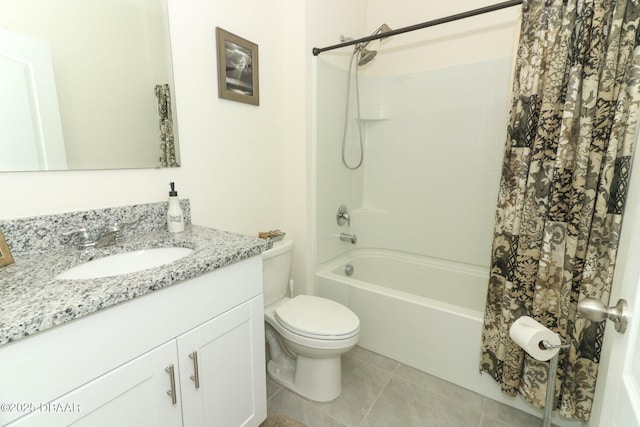 1313 Middle Lake Dr, Ormond Beach, FL 32174 - bathroom featuring toilet, shower / bath combo, vanity, and tile patterned floors