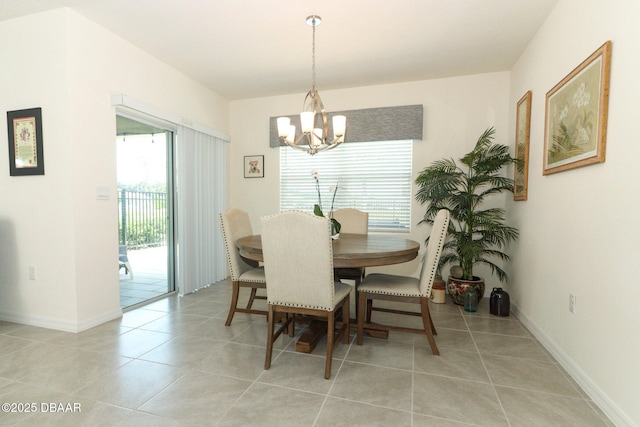 1313 Middle Lake Dr, Ormond Beach, FL 32174 - dining room featuring a chandelier, light tile patterned floors, and baseboards