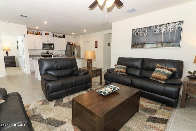1313 Middle Lake Dr, Ormond Beach, FL 32174 - living area with ceiling fan, light tile patterned flooring, and recessed lighting