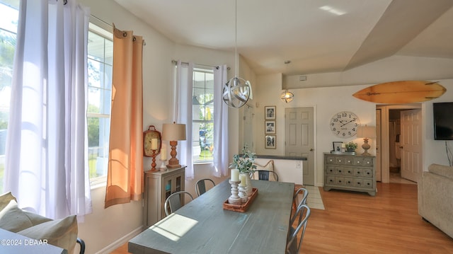 dining room with light wood-type flooring and plenty of natural light