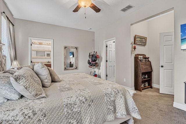 2412 Regency Park Dr, Deland, FL 32724 - bedroom featuring light carpet, baseboards, and a ceiling fan
