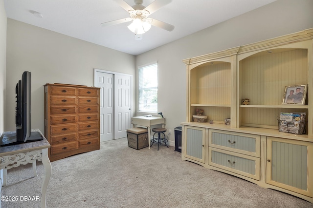 2412 Regency Park Dr, Deland, FL 32724 - bedroom with light carpet, ceiling fan, and a closet
