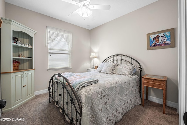2412 Regency Park Dr, Deland, FL 32724 - bedroom with carpet floors, baseboards, and a ceiling fan
