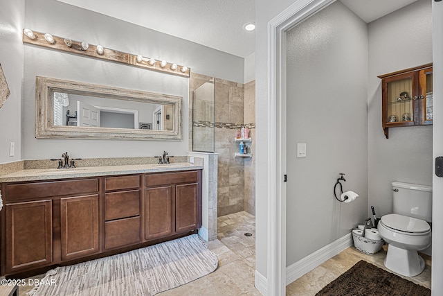 2412 Regency Park Dr, Deland, FL 32724 - bathroom with walk in shower, toilet, double vanity, and tile patterned flooring