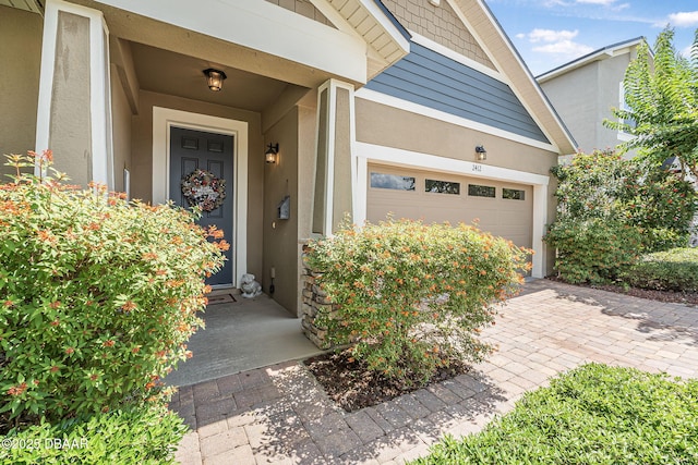 2412 Regency Park Dr, Deland, FL 32724 - property entrance featuring stucco siding and driveway