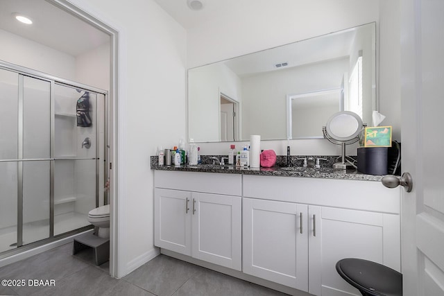 58 Bella Oaks Dr, Port Orange, FL 32129 - bathroom featuring double vanity, a stall shower, and tile patterned flooring