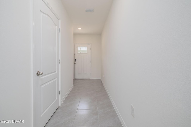 58 Bella Oaks Dr, Port Orange, FL 32129 - corridor featuring light tile patterned floors and recessed lighting