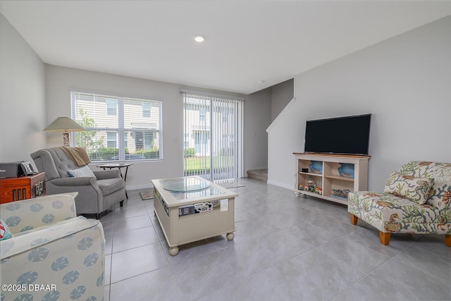 58 Bella Oaks Dr, Port Orange, FL 32129 - living room with plenty of natural light, light tile patterned floors, and recessed lighting