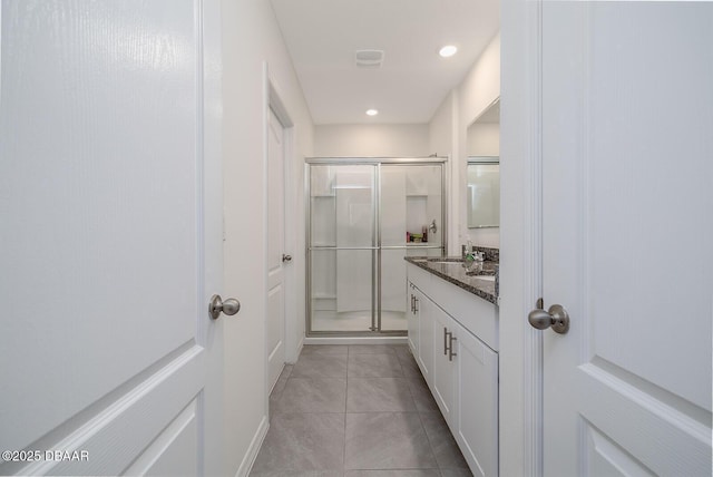 58 Bella Oaks Dr, Port Orange, FL 32129 - full bath with vanity, a shower stall, tile patterned flooring, and recessed lighting