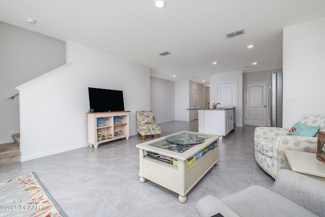58 Bella Oaks Dr, Port Orange, FL 32129 - living room featuring stairs, recessed lighting, and light tile patterned floors
