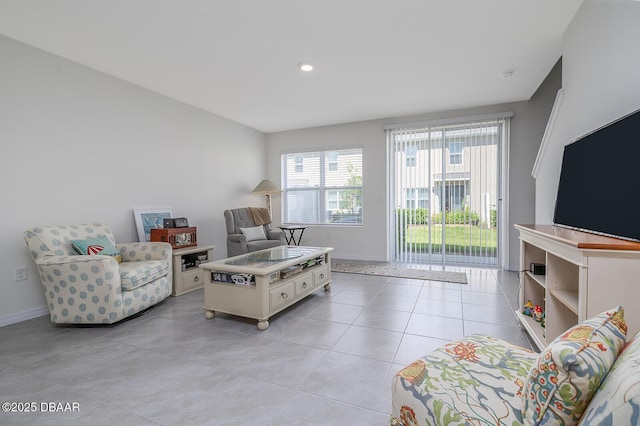 58 Bella Oaks Dr, Port Orange, FL 32129 - living area with baseboards and light tile patterned floors