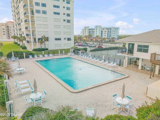 5499 S Atlantic Ave, New Smyrna Beach, FL 32169 - community pool featuring a patio area