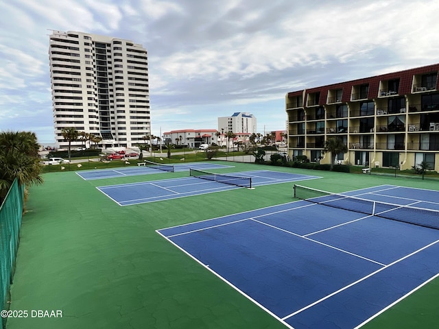 view of tennis court featuring basketball court