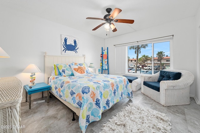 3600 S Ocean Shore Blvd # 111, Flagler Beach, FL 32136 - bedroom with baseboards and ceiling fan