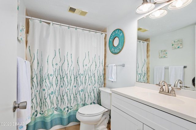 3600 S Ocean Shore Blvd # 111, Flagler Beach, FL 32136 - bathroom with toilet, vanity, visible vents, and a shower with shower curtain