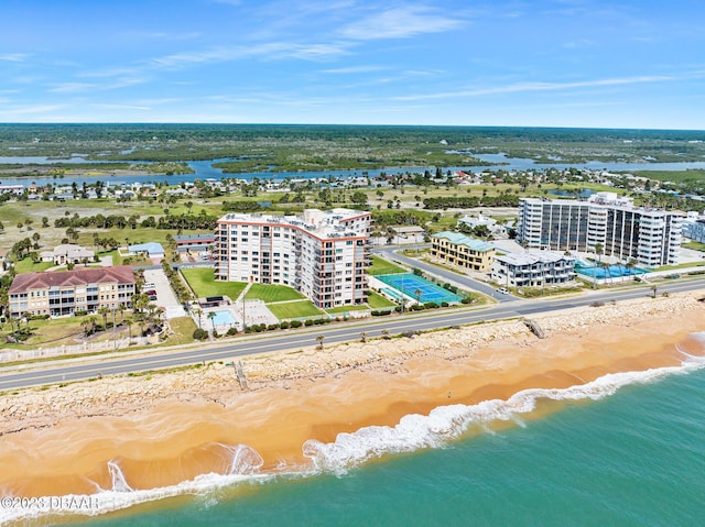 3600 S Ocean Shore Blvd # 111, Flagler Beach, FL 32136 - drone / aerial view featuring a water view and a beach view