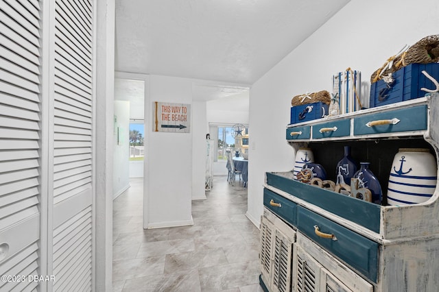 3600 S Ocean Shore Blvd # 111, Flagler Beach, FL 32136 - corridor with baseboards