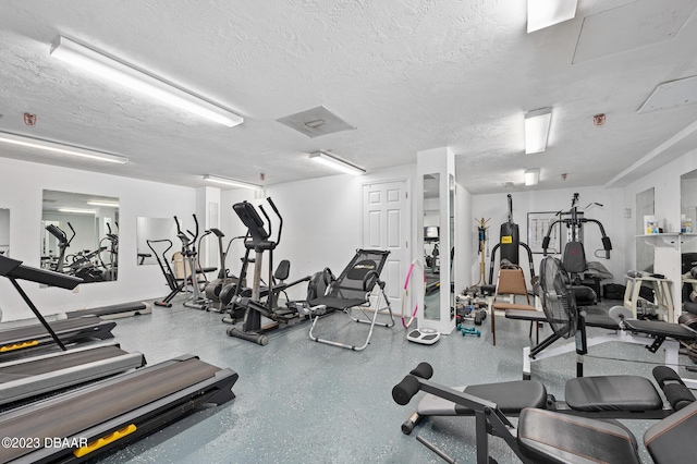 3600 S Ocean Shore Blvd # 111, Flagler Beach, FL 32136 - workout area with a textured ceiling
