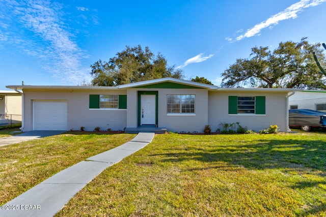 single story home with a garage and a front lawn