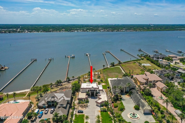 bird's eye view with a water view and a residential view