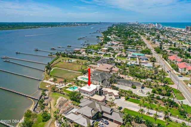 drone / aerial view featuring a water view