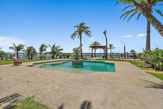 outdoor pool with fence, a pergola, and a patio