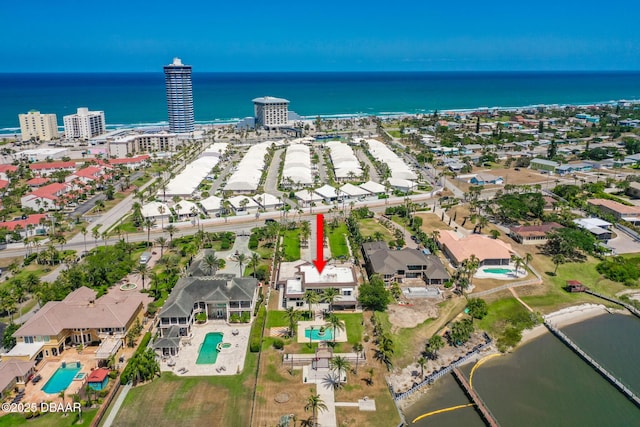 drone / aerial view with a water view