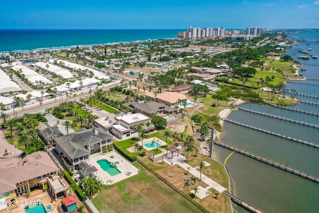 aerial view featuring a water view and a city view