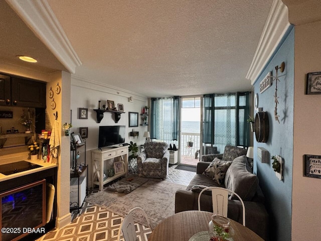 living room featuring crown molding, floor to ceiling windows, and a textured ceiling