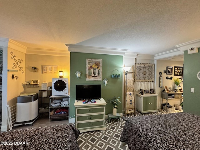 bedroom with a textured ceiling and ornamental molding