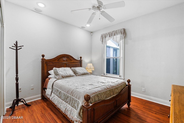 bedroom featuring a ceiling fan, recessed lighting, baseboards, and wood finished floors