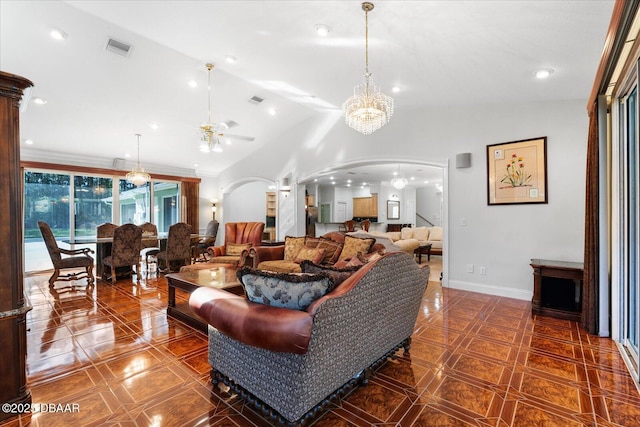 living room featuring baseboards, visible vents, arched walkways, and recessed lighting