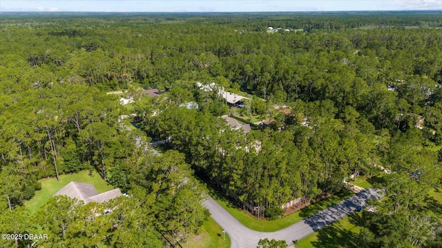 bird's eye view featuring a view of trees