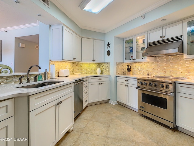 kitchen with white cabinetry, sink, ornamental molding, and stainless steel appliances