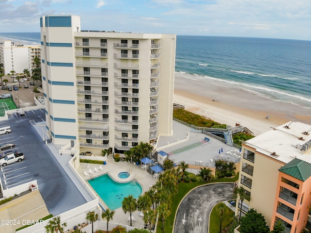 bird's eye view with a view of the beach and a water view