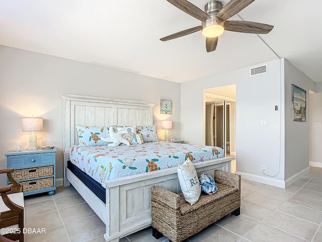 bedroom featuring light tile patterned floors, baseboards, visible vents, and a ceiling fan