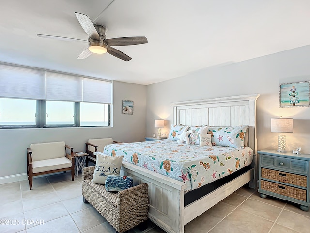 bedroom featuring light tile patterned floors and a ceiling fan