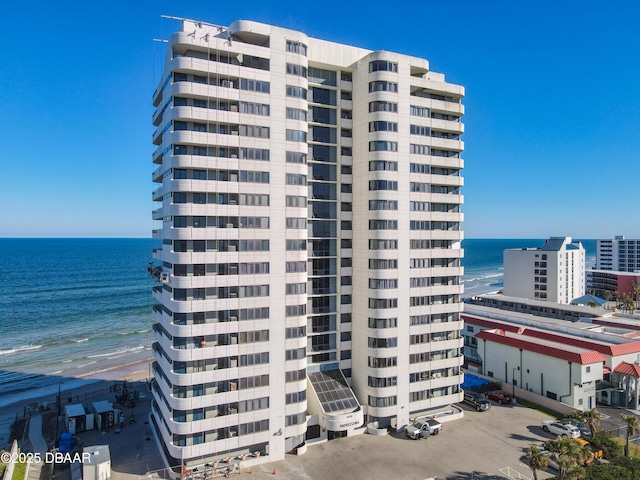 view of building exterior with a water view