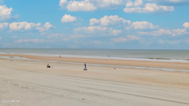 view of water feature with a beach view